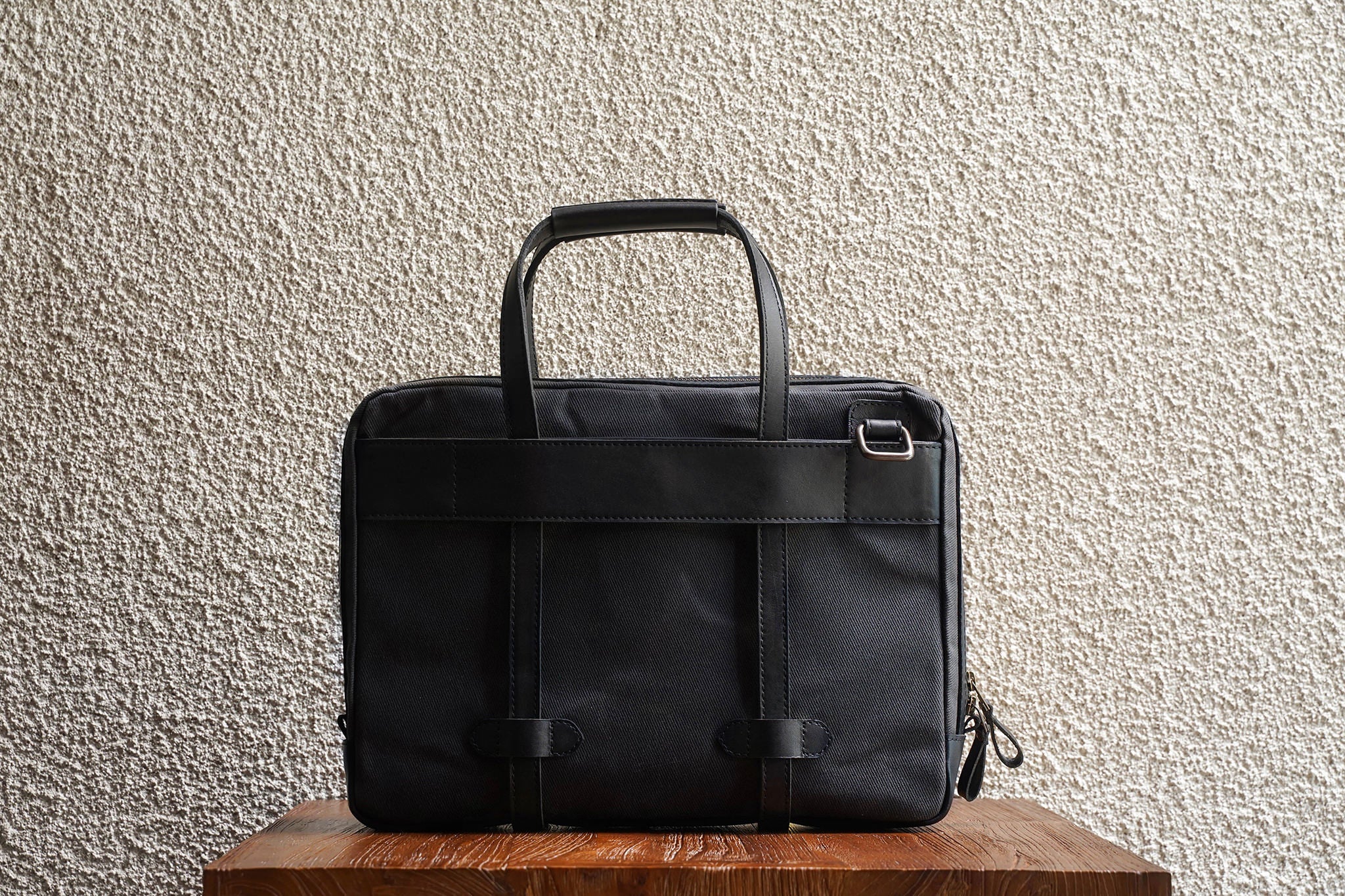 Traveling made easy with the luggage handle slot at the back.