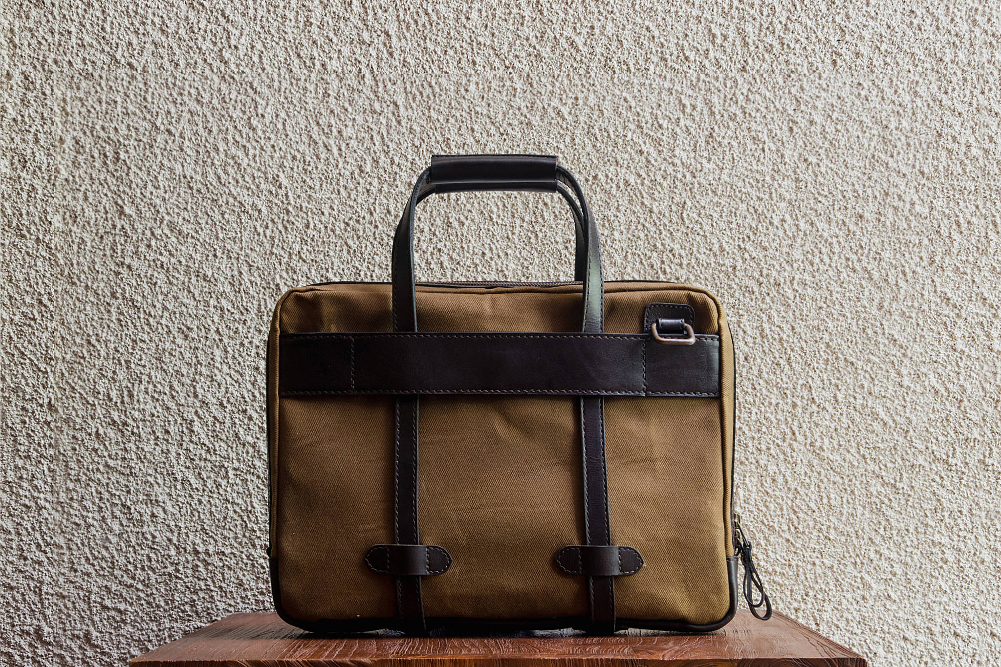 Traveling made easy with the luggage handle slot at the back.
