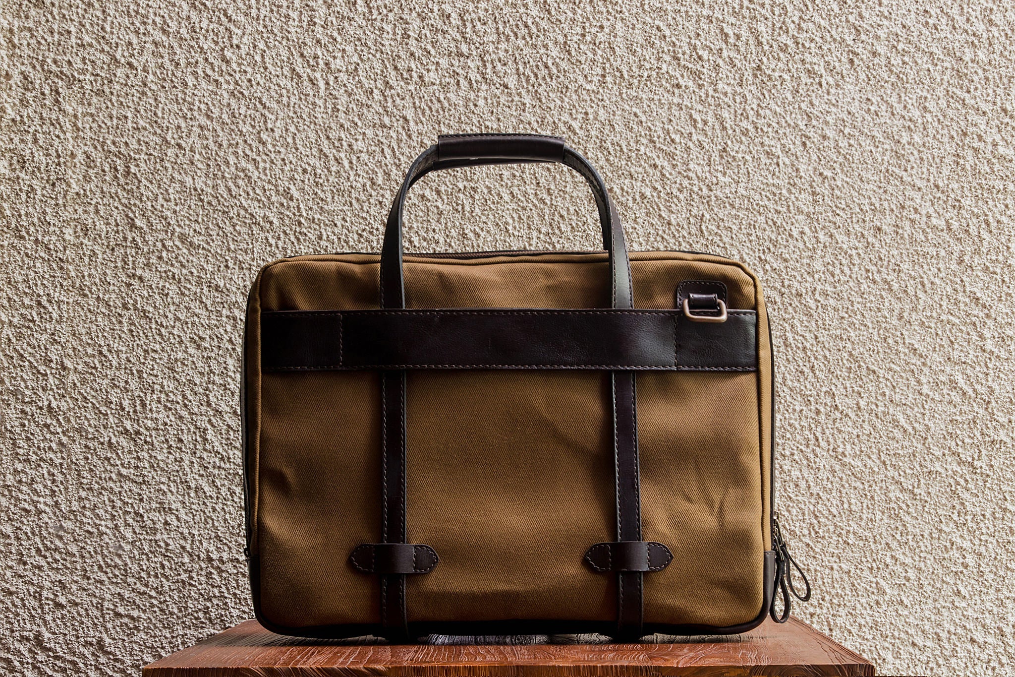 Traveling made easy with the luggage handle slot at the back.