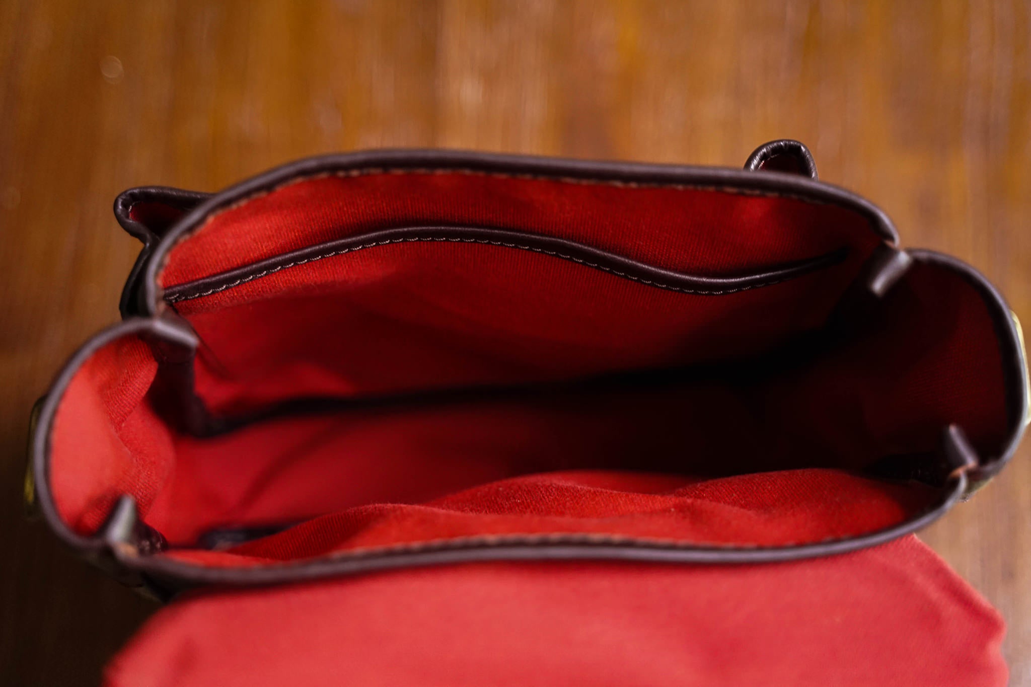 A view of the inside of the F.C. while empty. Note that all inside facing accessories such as rivets are covered, to avoid scratching the bag's contents.