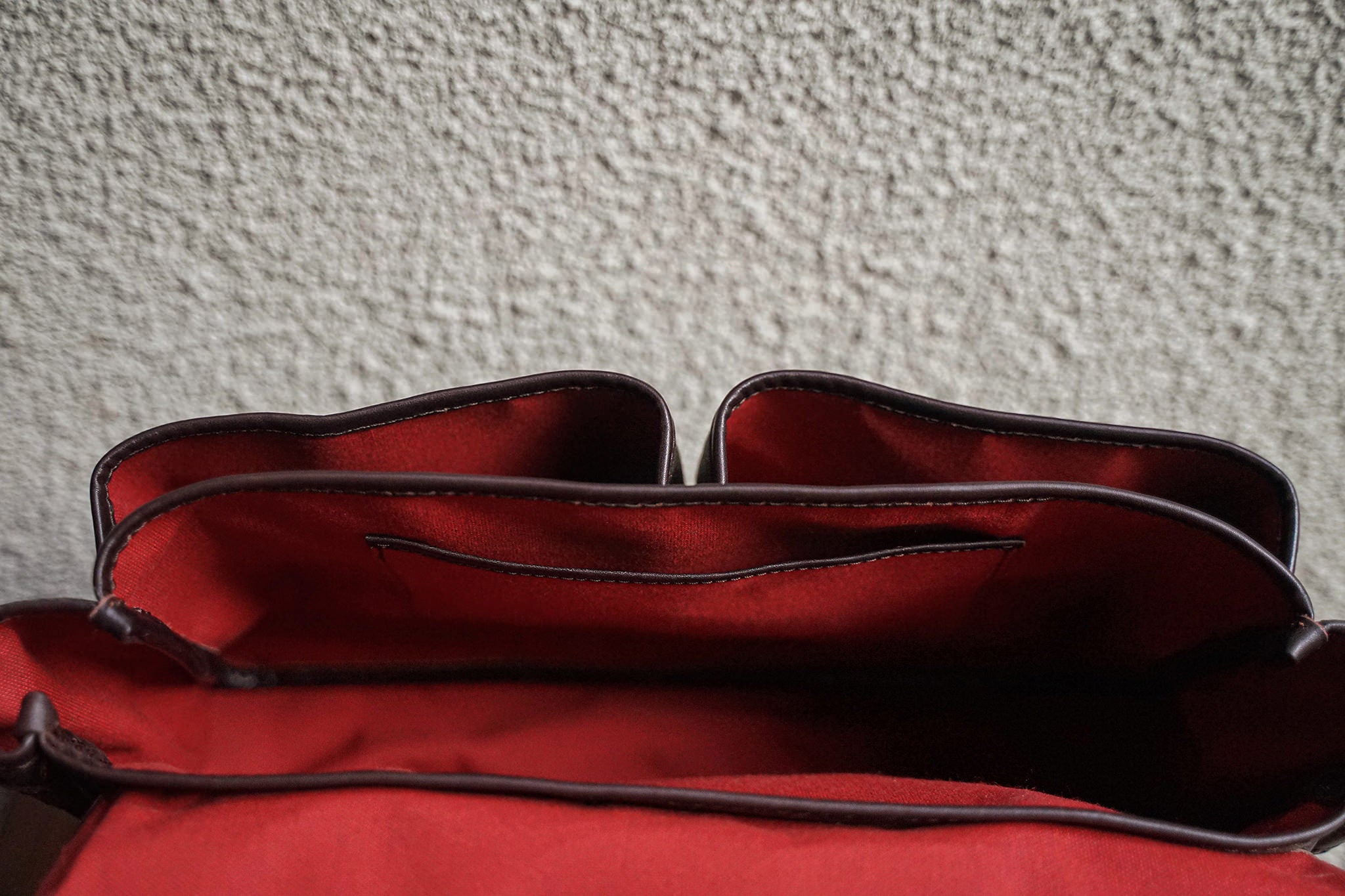 A view of the inside of the F.C. while empty. Note that all inside facing accessories such as rivets are covered, to avoid scratching the bag's contents.