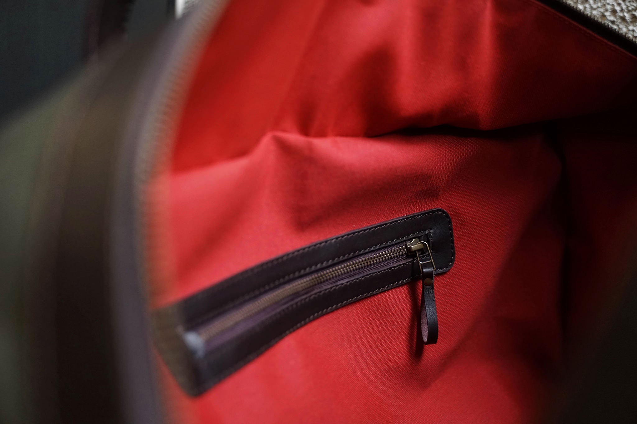 One zippered pocket inside.